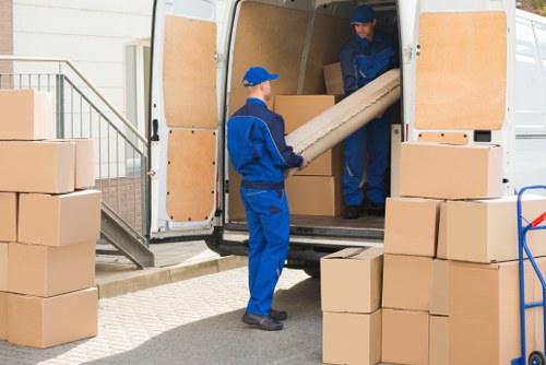 Professional moving team in Mansfield packing belongings