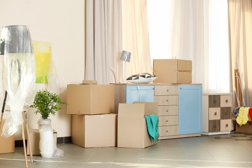 Movers handling furniture during a move in Carlton