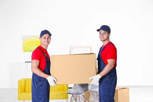 Professional moving team assisting with a Claremont relocation