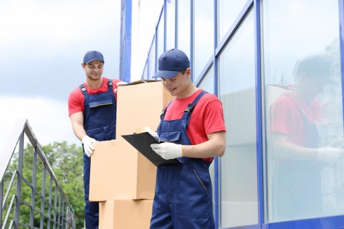 Movers securing items for transportation