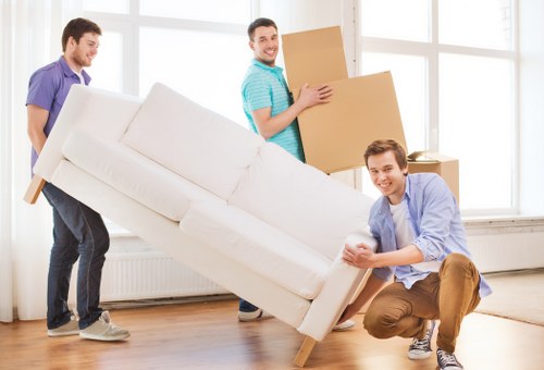 Sam Movers' team efficiently packing office furniture