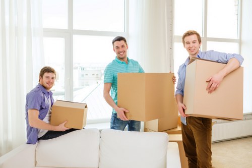 Sam Movers staff packing and organizing belongings