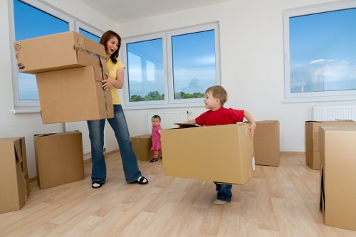 Professional moving team handling furniture in Belmont