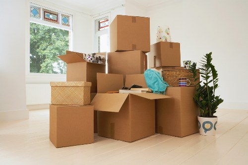 Experienced movers packing items securely for transport